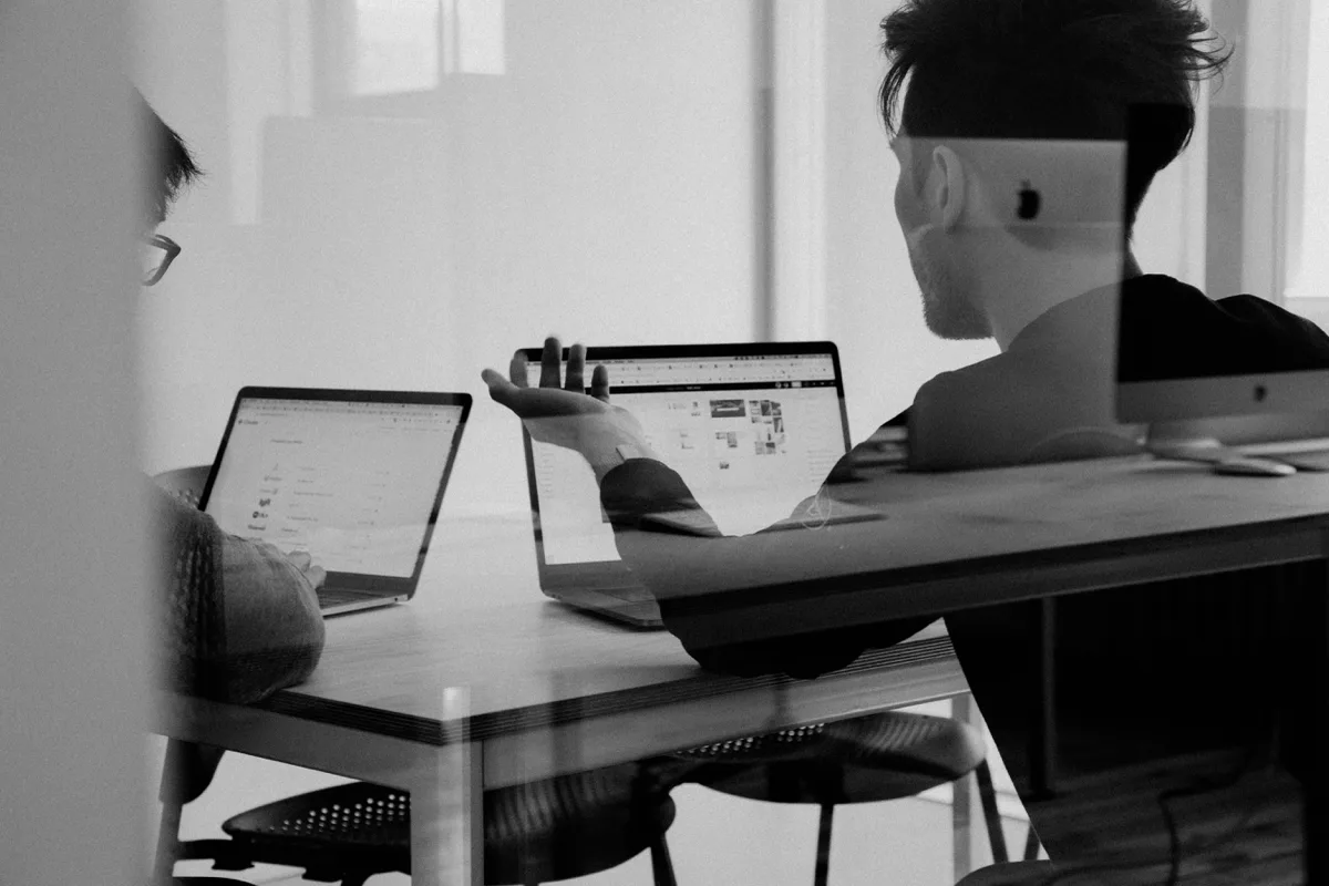 Operations team reviewing performance data together in a modern office